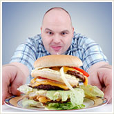 Man Salivating over a Big Burger